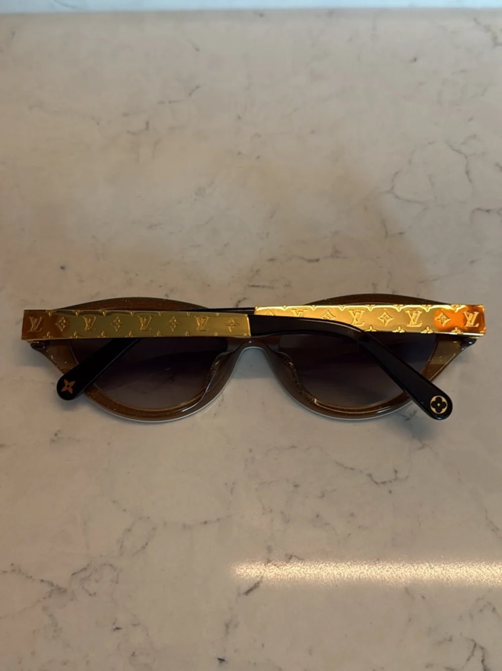 Louis Vuitton tone eye coverage